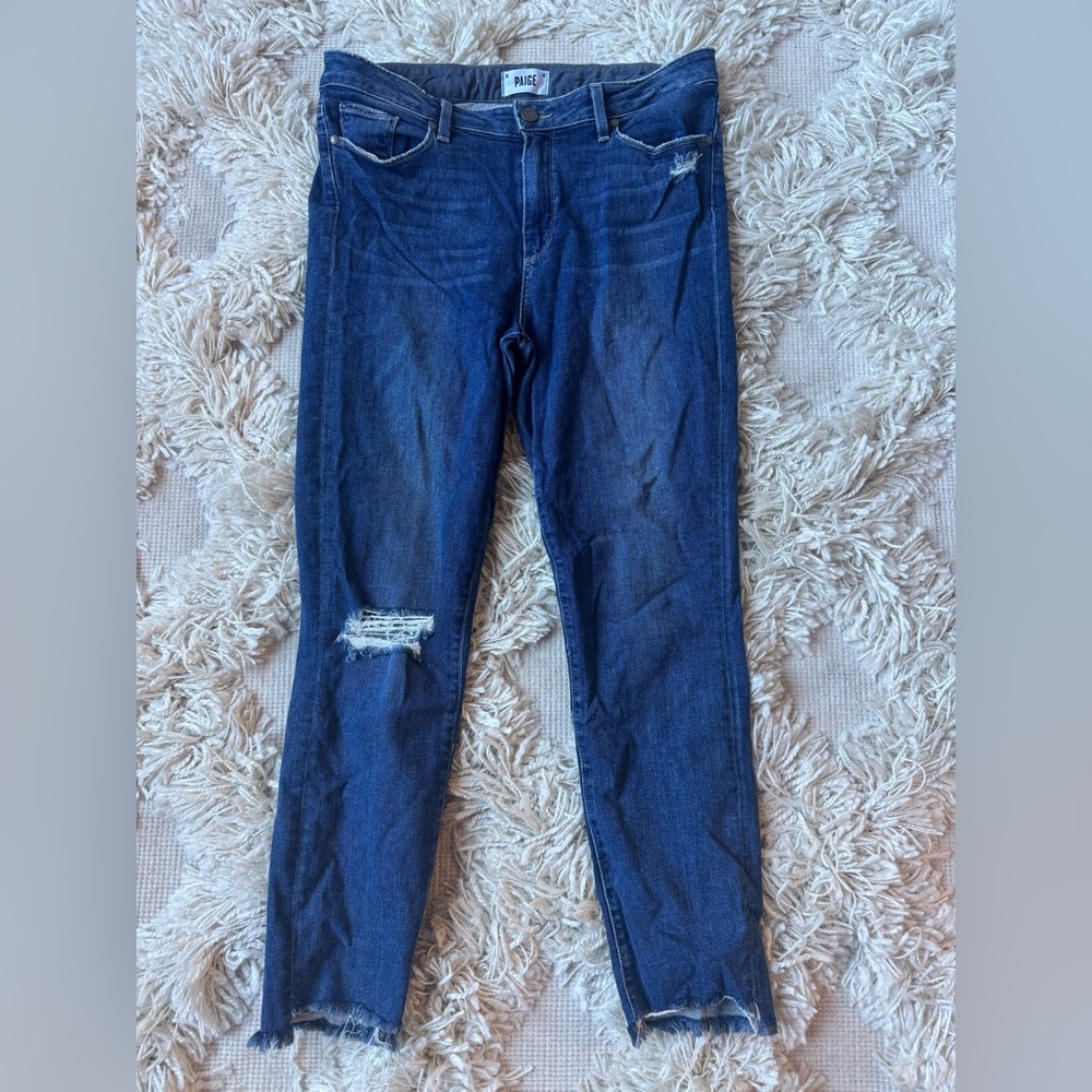 Paige Peg Leg destroyed jeans in size 32.
